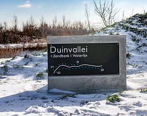 Winterlandschaft bei Duinvallei 09, Ferienhaus in De Groote Duynen, Kamperland, mit Schild und Schnee.