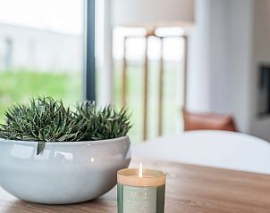 Inspirerende muurdecoratie in Zandbank 22, vakantiehuis in Kamperland, Noord-Beveland.