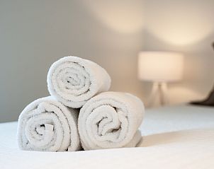 Kunstzinnige muurdecoratie in Zandbank 22, vakantiehuis in Kamperland, Zeeland.