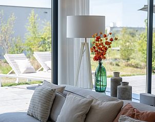 Gezellige zithoek met uitzicht op het terras in Zandbank 21 | De Groote Duynen, Kamperland.