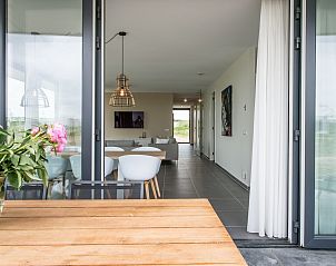 Uitzicht op de eetkamer vanuit het terras van Zandbank 18 | De Groote Duynen, Kamperland.