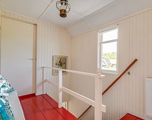 Slaapkamer in vakantiehuis ZE1136, Kamperland, Zeeland, met uitzicht op de velden.