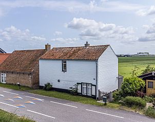 Groen uitzicht vanuit de tuin van vakantiehuis ZE1136 in Kamperland, Zeeland.