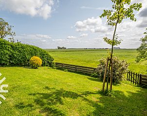 Gezellige zithoek op de overloop van vakantiehuis ZE1136 in Kamperland, Zeeland.