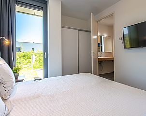 Natuur rondom Duinvallei 22, vakantiehuis in Kamperland, Noord-Beveland, met rietvelden en water in de winter.