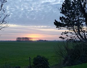 Genieen Sie den ruhigen Sonnenuntergang im Ferienhaus in Kamperland, umgeben von der weitlufigen Natur in Noord-Beveland, Zeeland.
