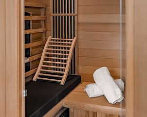 Stylish interior of Wellness Lodge 4 in Scharendijke, Zeeland, with modern decoration in the vacation home.