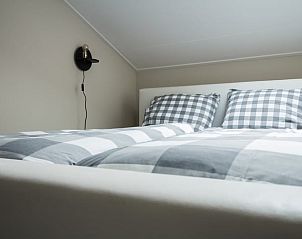 Comfortabele slaapkamer in Vakantiehuis in Scharendijke, ideaal voor een goede nachtrust in Schouwen-Duiveland, Zeeland.