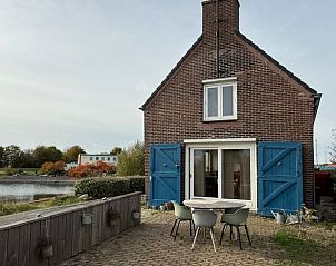 Huisje in Bruinisse vakantiehuis met terras aan het water, Schouwen-Duiveland, Zeeland.