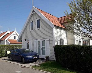 Sfeervolle slaapkamer in vakantiehuis ZE217 in Bruinisse, Schouwen-Duiveland, Zeeland.