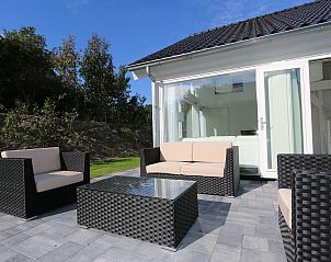 Cozy terrace at Holiday home Zonnedorp 4, Villa Jula, Renesse, ideal for relaxing in the fresh air.