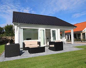 Villa Jula in Renesse, Holiday home Zonnedorp 4, with a spacious terrace and modern outdoor space in Zeeland.