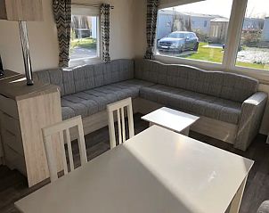 Cozy living room in VZ1012 Holiday chalet in Renesse, ideal for family gatherings in Schouwen-Duiveland, Zeeland.