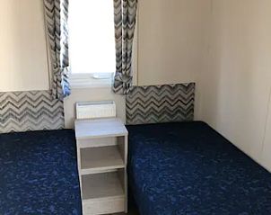 Second bedroom with two beds in VZ1012 Holiday chalet in Renesse, Schouwen-Duiveland, Zeeland.