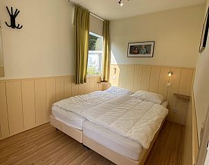 Cozy bedroom in VZ891 Holiday home in Renesse with view of nature, Schouwen-Duiveland, Zeeland.