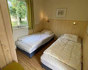 Cyclist near VZ891 Holiday home in Renesse, Schouwen-Duiveland, Zeeland.