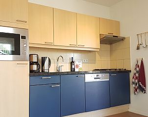 Moderne Kche im Ferienhaus Horizon 95 in Renesse, komplett ausgestattet fr alle Ihre Kochbedrfnisse.