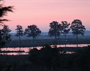 Beautiful view at sunset from Holiday home in Renesse, Schouwen-Duiveland, surrounded by nature.