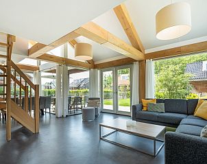 Bright living room of Holiday home Zonnedorp 22 Anoes in Renesse with modern furnishings.