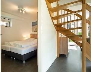 Bedroom with double bed in Holiday home Zonnedorp 22 Anoes, Renesse.