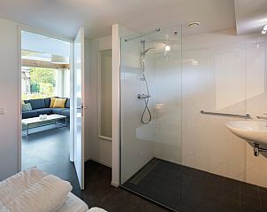 Bathroom with walk-in shower in Holiday home Zonnedorp 22 Anoes, Renesse, Zeeland.