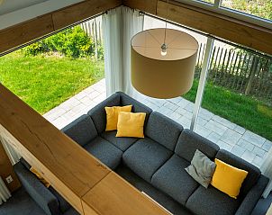 View of the living room from upstairs in Holiday Home Zonnedorp 22 Anoes, Renesse.