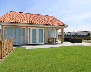 Vacation home Zonnedorp 18, Duinhuis 18 in Renesse, Zeeland with enclosed garden and terrace.