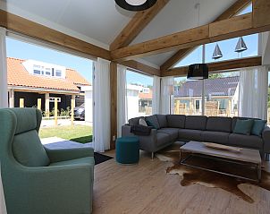 Spacious and bright living room in Holiday home Zonnedorp 28 in Renesse, Zeeland.