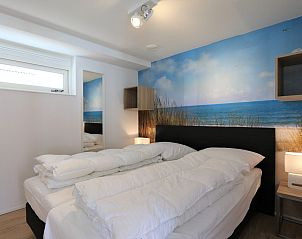 Beach-themed bedroom in Holiday home Zonnedorp 28 in Renesse, Zeeland.