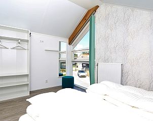 Spacious bedroom with lots of light in Holiday home Zonnedorp 28 in Renesse, Zeeland.
