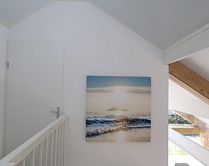 Stairs with sea view artwork in Holiday home Zonnedorp 28 in Renesse, Zeeland.