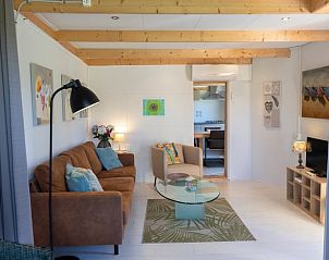 Stylish living room of Huisje in Renesse, a vacation home in Renesse surrounded by nature.