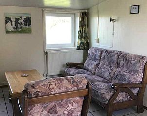 Gezellige woonkamer van vakantiehuis ZE182 in Kerkwerve, Schouwen-Duiveland, Zeeland.