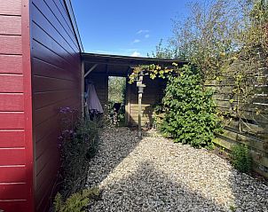 Comfortabele zitruimte in vakantiehuis ZE182, Kerkwerve, met uitzicht op de tuin, Zeeland.