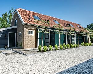 Vooraanzicht van Vakantiehuisje in Noordwelle, charmante gevel in Schouwen-Duiveland, Zeeland.