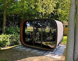 Unieke buitenruimte bij Vakantiehuis in Noordwelle, omringd door natuur in Schouwen-Duiveland.