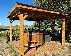 Buitenspa bij Vakantiehuis in Noordwelle, perfect voor ontspanning in Schouwen-Duiveland.