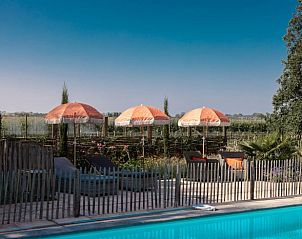 Zonnebad op terras bij Vakantiehuis in Noordwelle, Schouwen-Duiveland, ideaal voor zomers.