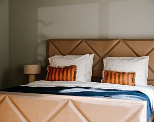 Comfortabele slaapkamer in Vakantiehuis in Noordwelle, Schouwen-Duiveland, ideaal voor rust.