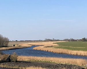 Rustgevende rivierlandschap bij Vakantiehuis in Zonnemaire, ideaal voor ontspanning, Zeeland.