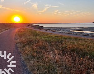 Knusse zithoek in vakantiehuis ZE1221, Sint-Annaland, Tholen, met comfortabele bank.