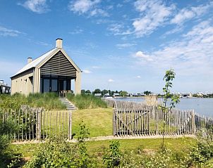 Vakantiehuis Oesterdam Resort in Tholen, Zeeland met prachtig uitzicht op het water.