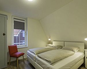 Ruime slaapkamer in Vakantiehuis Dishoek Dunes Residence, Koudekerke, Walcheren, Zeeland.