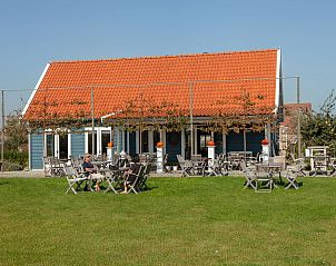 Auenterrasse im Ferienhaus 'T Bloemenhof Koudekerke mit gemtlichen Sitzgelegenheiten, Walcheren, Zeeland.