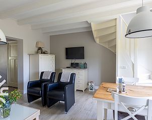 Dining room with lots of light in vacation home ZE068 in Oostkapelle, Walcheren, Zeeland.