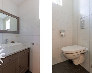 Kitchen with recipes on the wall in vacation home ZE068 in Oostkapelle, Walcheren, Zeeland.