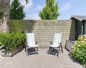 Wine and cheese on the terrace of vacation home ZE068 in Oostkapelle, Walcheren, Zeeland.