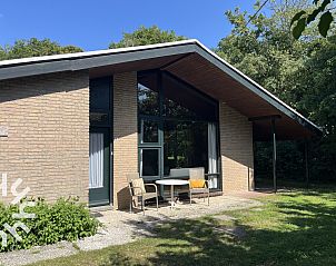 Bedroom with double bed in vacation home ZE366 in Oostkapelle, Walcheren.