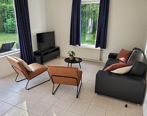 Cozy living room with TV in VZ2330 Holiday home Oostkapelle, Walcheren, Zeeland.