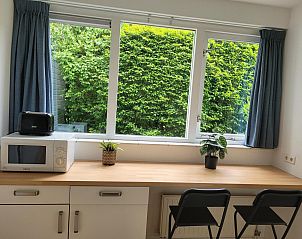 Workspace overlooking garden in VZ2330 Holiday home Oostkapelle, Walcheren, Zeeland.